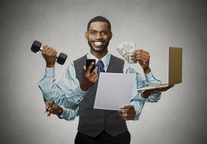 Multitasking happy business man isolated on grey wall background. Busy life of company manager corporate executive. Many errands concept